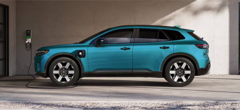 Honda Prologue using a home charging station in a home garage